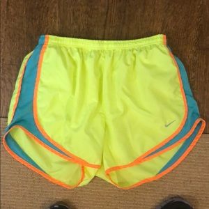 Neon yellow Nike shorts